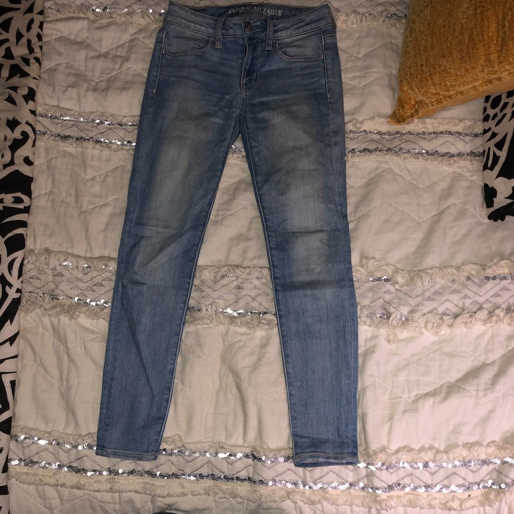 Light wash AE skinny jeans